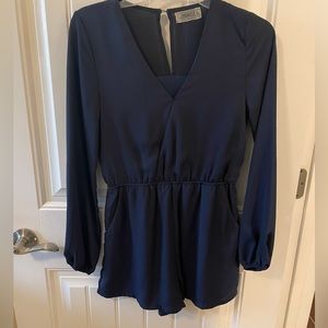 Navy Boutique romper size S. Hanger brand.